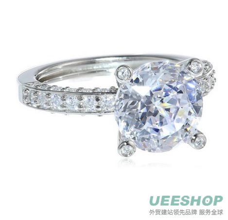 Platinum Plated Sterling Silver "100 Facets Collection" Solitaire Cubic Zirconia Ring with Channel-Set Cubic Zirconia Accent (6 cttw)
